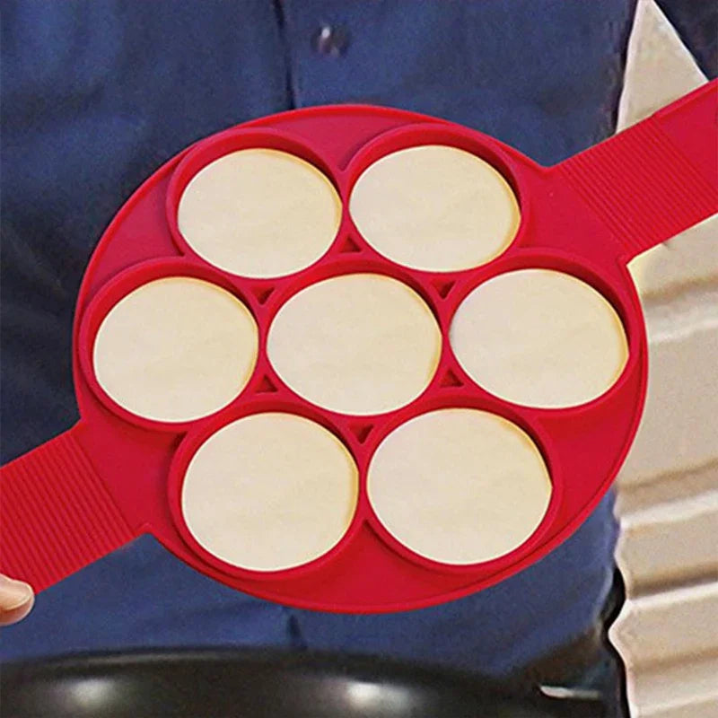 "Flip 'N' Sizzle Pancake Pro: 7-Slot Silicone Wonder Mold for Perfect Pancakes & Eggs Every Time!