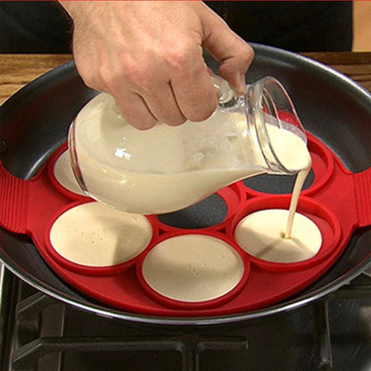 "Flip 'N' Sizzle Pancake Pro: 7-Slot Silicone Wonder Mold for Perfect Pancakes & Eggs Every Time!